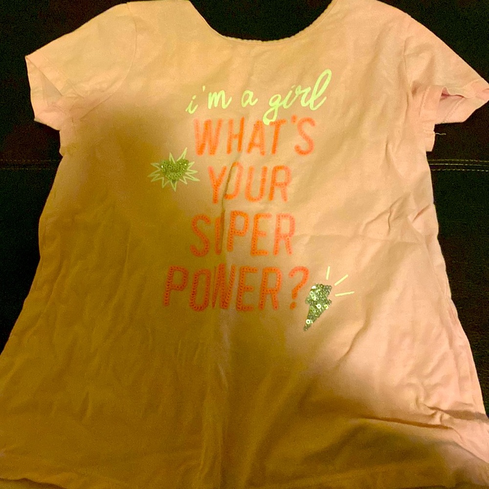 I am selling the cutest most in powering pink shirt for young girls.